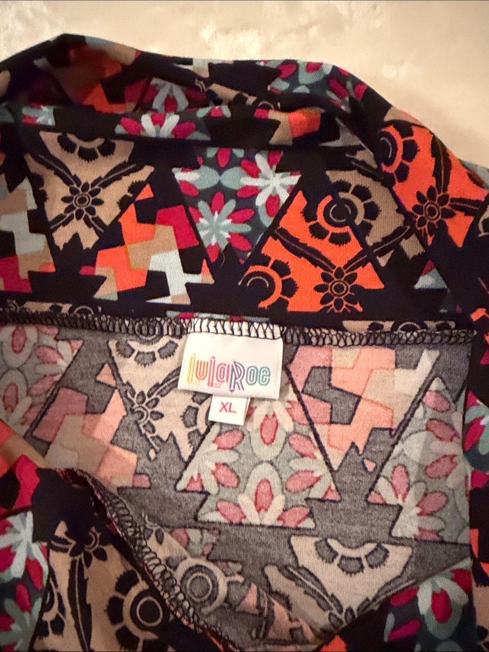 LuLaRoe XL Black Top with Orange, Teal, Pink & Cream Geometric Floral Print